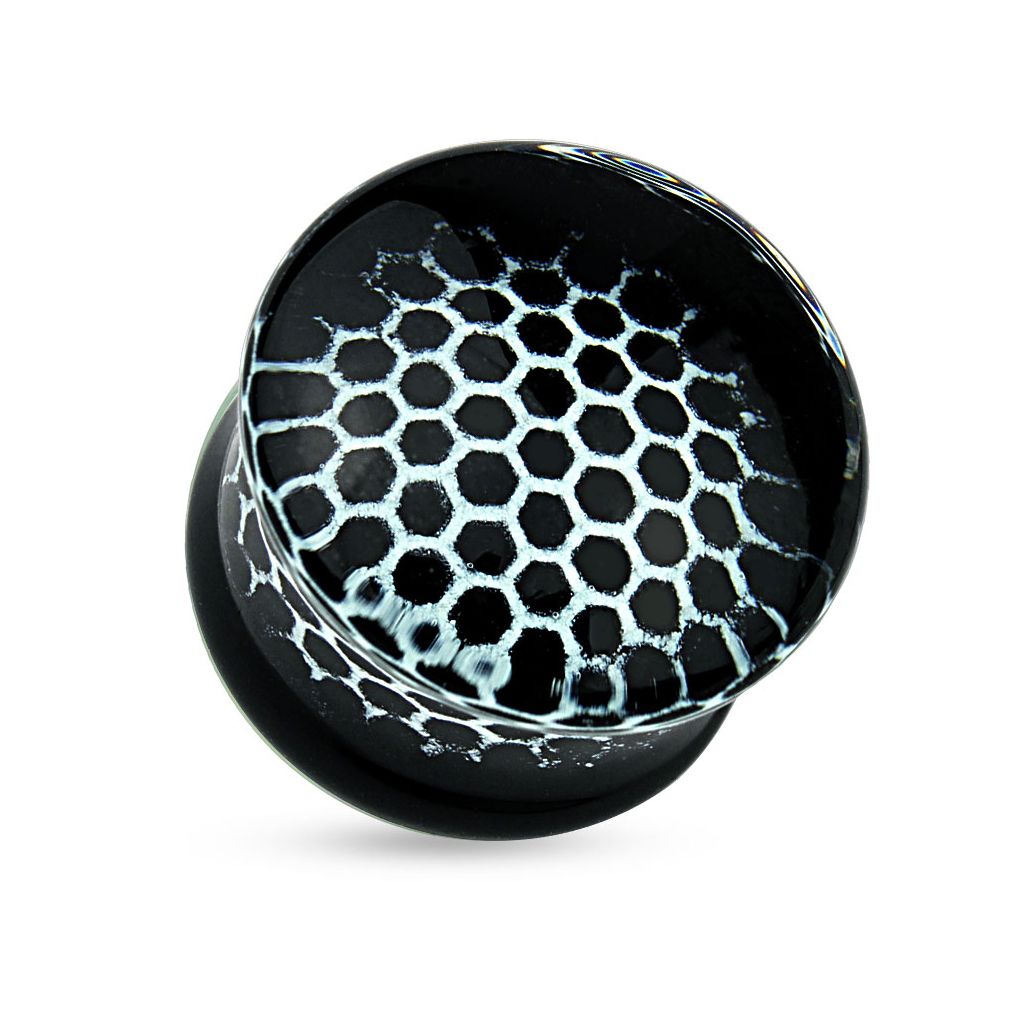 Klaasist plug kaunistatud kuusnurkade mustiga